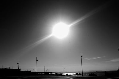 Scenic view of silhouette beach against sky