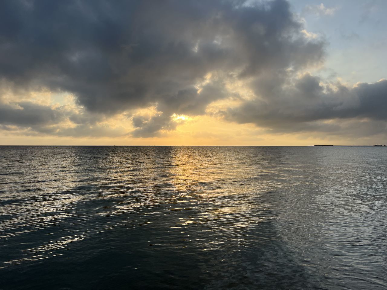 Sky Water Cloud Sea Beauty In Nature Horizon Horizon Over Water Scenics - Nature Nature Dramatic Sky Sunlight Sunset Ocean Tranquility Storm Seascape Shore Environment Coast Cloudscape