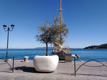 Scenic view of sea against clear blue sky