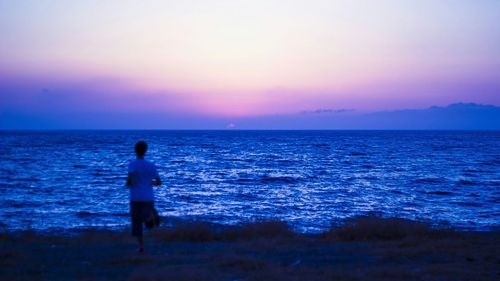 Scenic view of sea at sunset