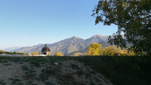 Scenic view of mountains against clear sky