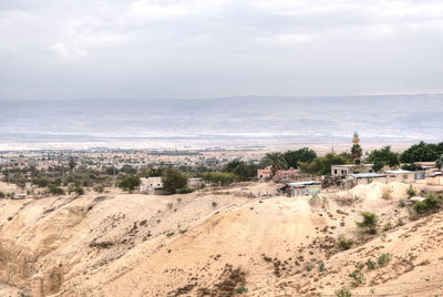 Panoramic view of landscape and buildings against sky