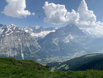 Scenic view of snowcapped mountains against sky