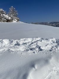 Scenic view of snowcapped mountain against sky