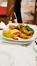 Close-up of food served on table