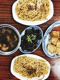 Close-up of noodles served on table