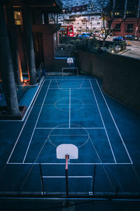 High angle view of basketball hoop at night