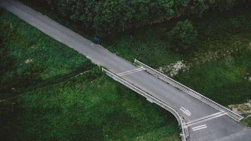 High angle view of road amidst trees