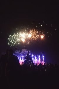 Firework display at night