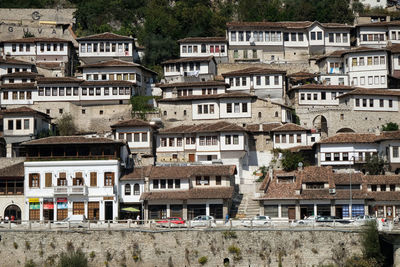 Traditional ottoman houses in old town berat known as the white city of albania