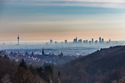 Panoramic view of buildings against sky during sunset