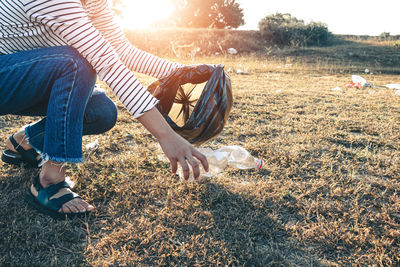 People with dog on field