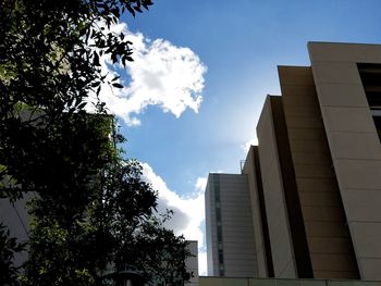 Low angle view of skyscrapers against sky