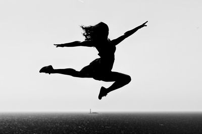 Full length of man jumping