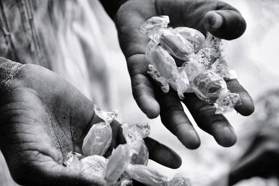 Close-up of hand holding water