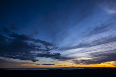 Low angle view of dramatic sky during sunset