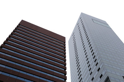 Low angle view of modern buildings against clear sky