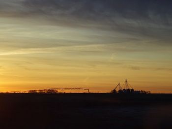 Scenic view of landscape at sunset