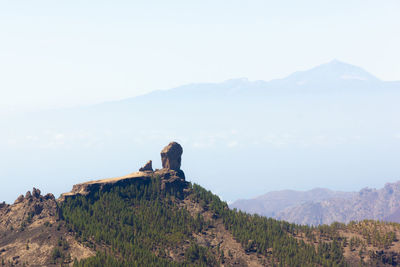 Scenic view of landscape and mountains against sky