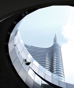 Low angle view of modern building against sky