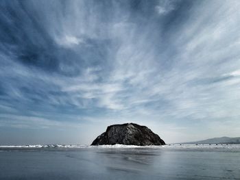 Scenic view of sea against dramatic sky