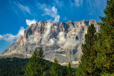 Low angle view of majestic mountains against sky