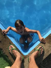 High angle view of man swimming in pool