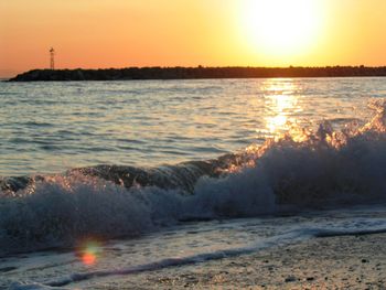 Scenic view of sea against sky during sunset