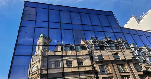 Low angle view of modern building against sky