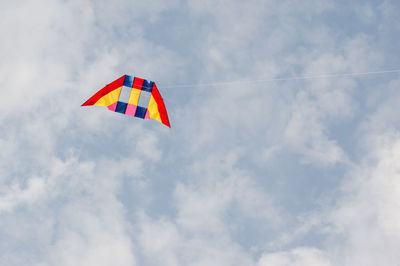 Low angle view of kite against sky