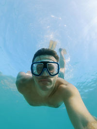 Man swimming in sea