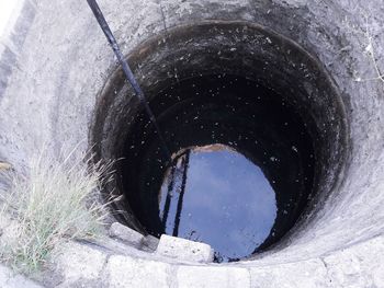 Blue sky seen through hole in tunnel