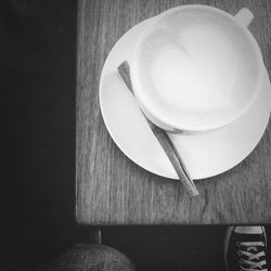 Close-up of coffee cup on table