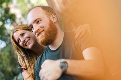 Portrait of happy young couple