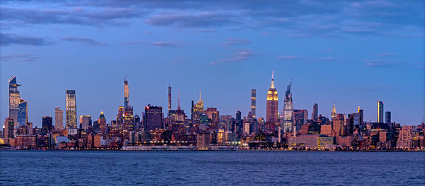 View of buildings in city at waterfront