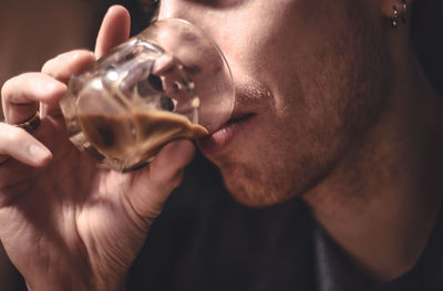 Close-up of men drinking tea