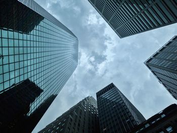 Low angle view of modern buildings against sky