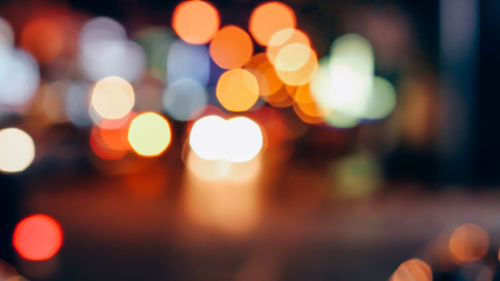 Defocused image of illuminated lights at night