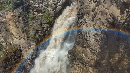 High angle view of rainbow over river