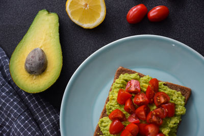 High angle view of fruits in bowl on table