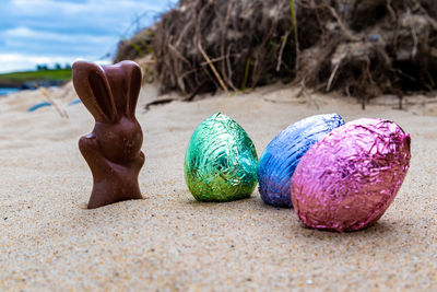 Close-up of multi colored easter eggs on land