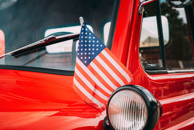 Close-up of red flag in car