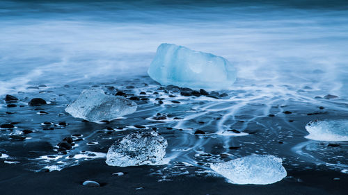 Close-up of ice floating on water in sea