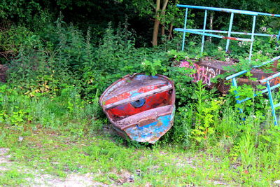 Abandoned container on field