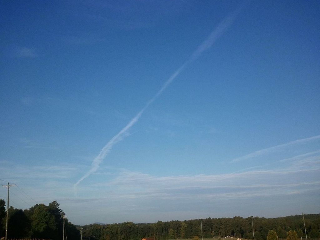 blue, sky, tranquility, tranquil scene, landscape, scenics, beauty in nature, nature, tree, field, cloud - sky, idyllic, vapor trail, cloud, non-urban scene, outdoors, no people, growth, remote, horizon over land