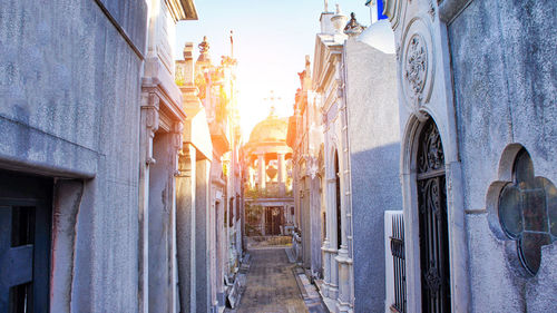 Panoramic shot of buildings in city against sky