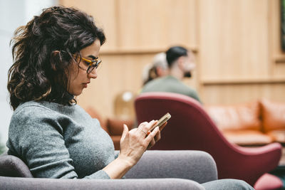 Young woman using mobile phone
