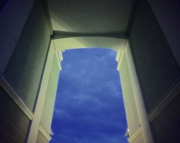 Low angle view of building against blue sky