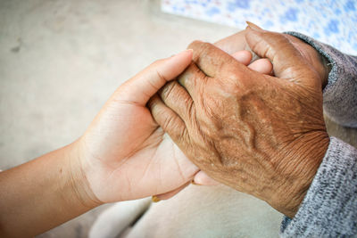 High angle view of hands