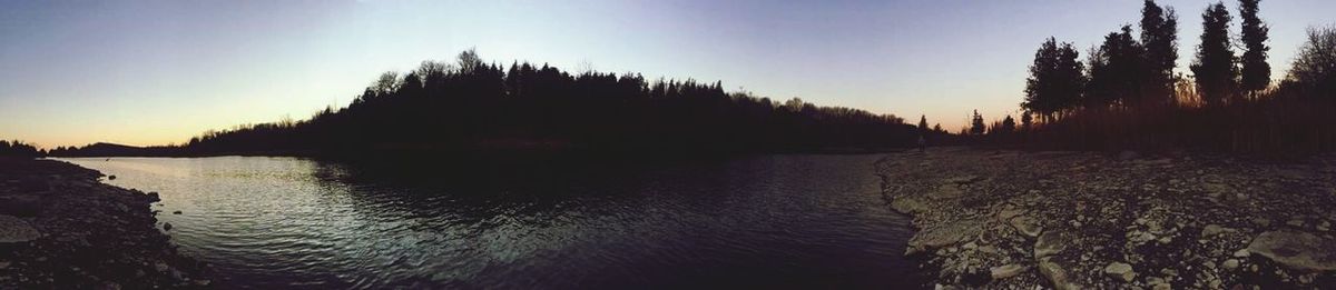 Scenic view of lake at sunset